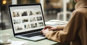 Shopper browsing products online while researching purchase options on a laptop.